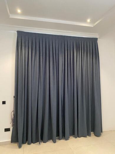 A pair of straight curtains made and hung by KD Dream Space Designs