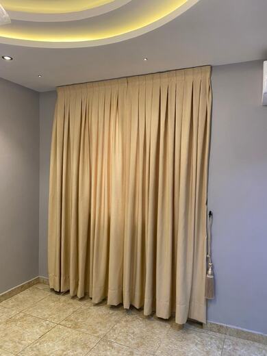 A pair of straight curtains made and hung by KD Dream Space Designs