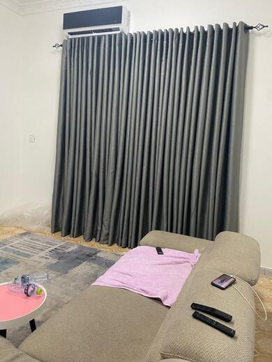 A pair of straight curtains made and hung by KD Dream Space Designs