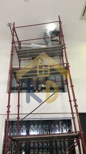 Fixing a track at height on site for KD Dream Space Designs