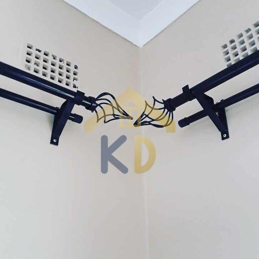 A curtain pole fitted by KD Dream Space Designs